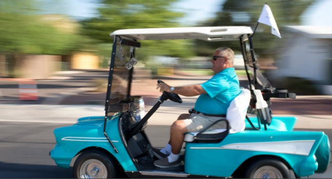 Driving golf cart